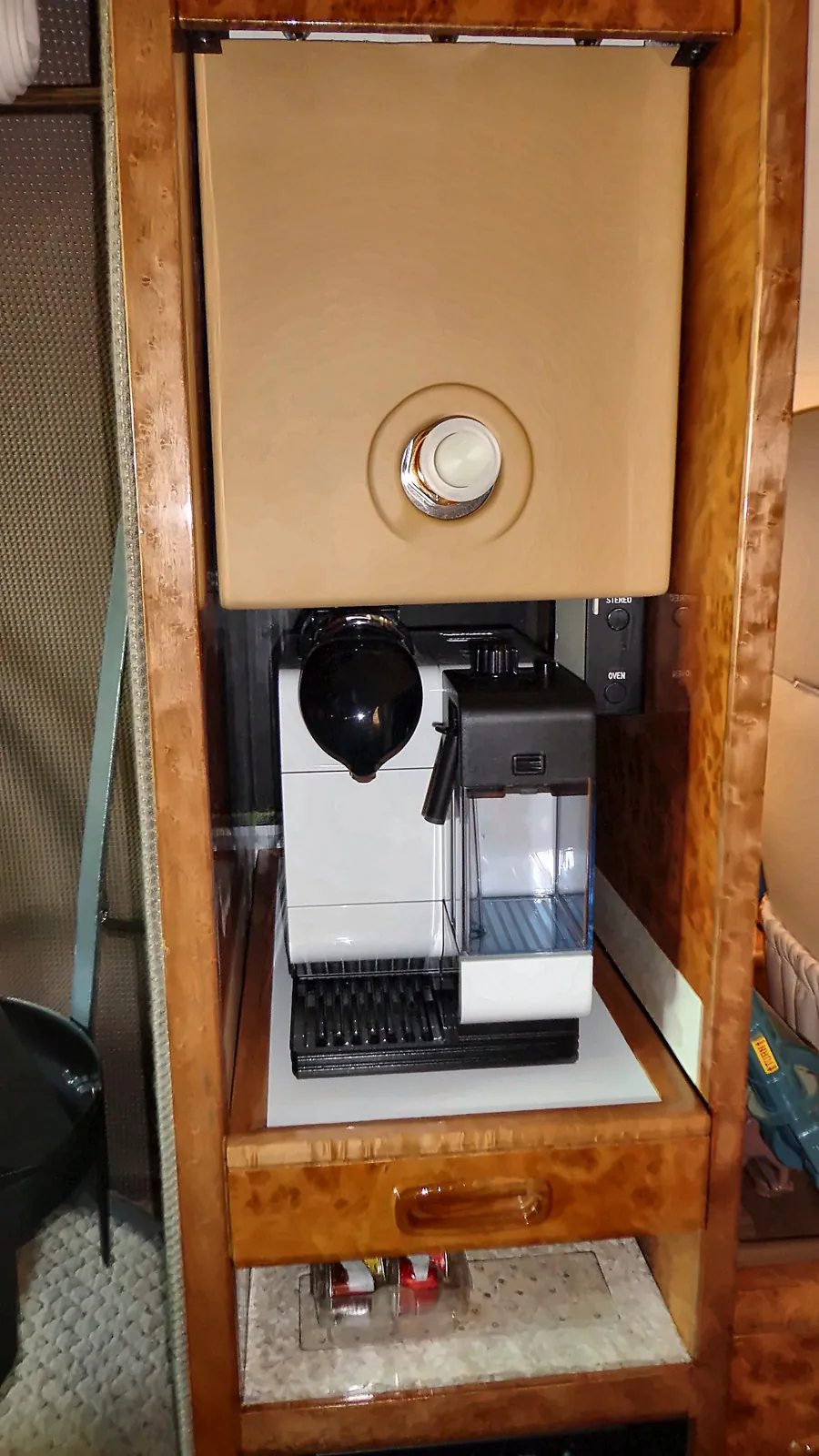 Burl wood refreshment cabinet in a Sabreliner cabin